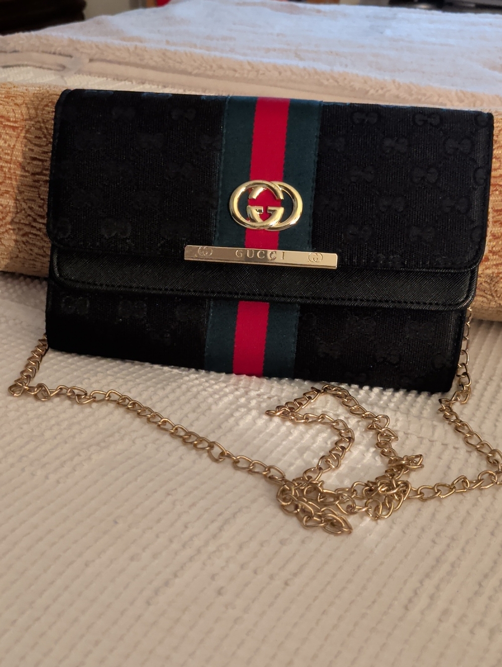 Black Bag With Gold Chain.